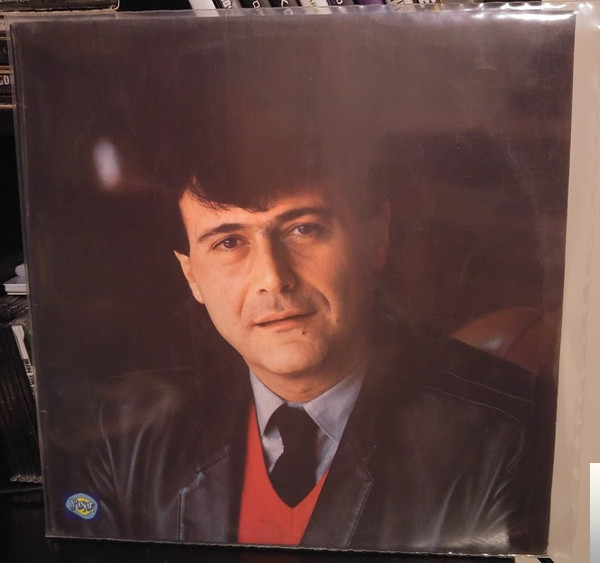 دانلود آهنگ Bir Dinlesen Kalbimi - Ferdi Özbeğen از Ferdi Özbeğen