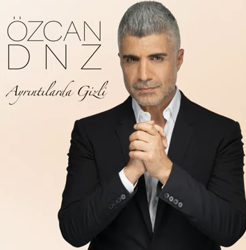 دانلود آهنگ Ayrıntılarda Gizli - Özcan Deniz از Özcan Deniz